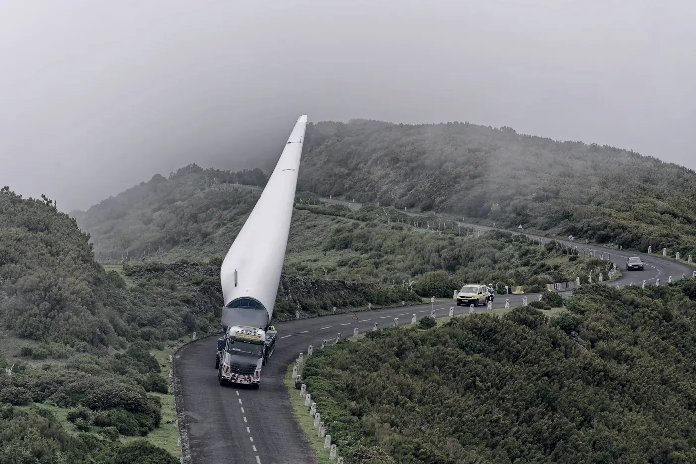 Wind turbine blade on a specialist trailer on a mountain road