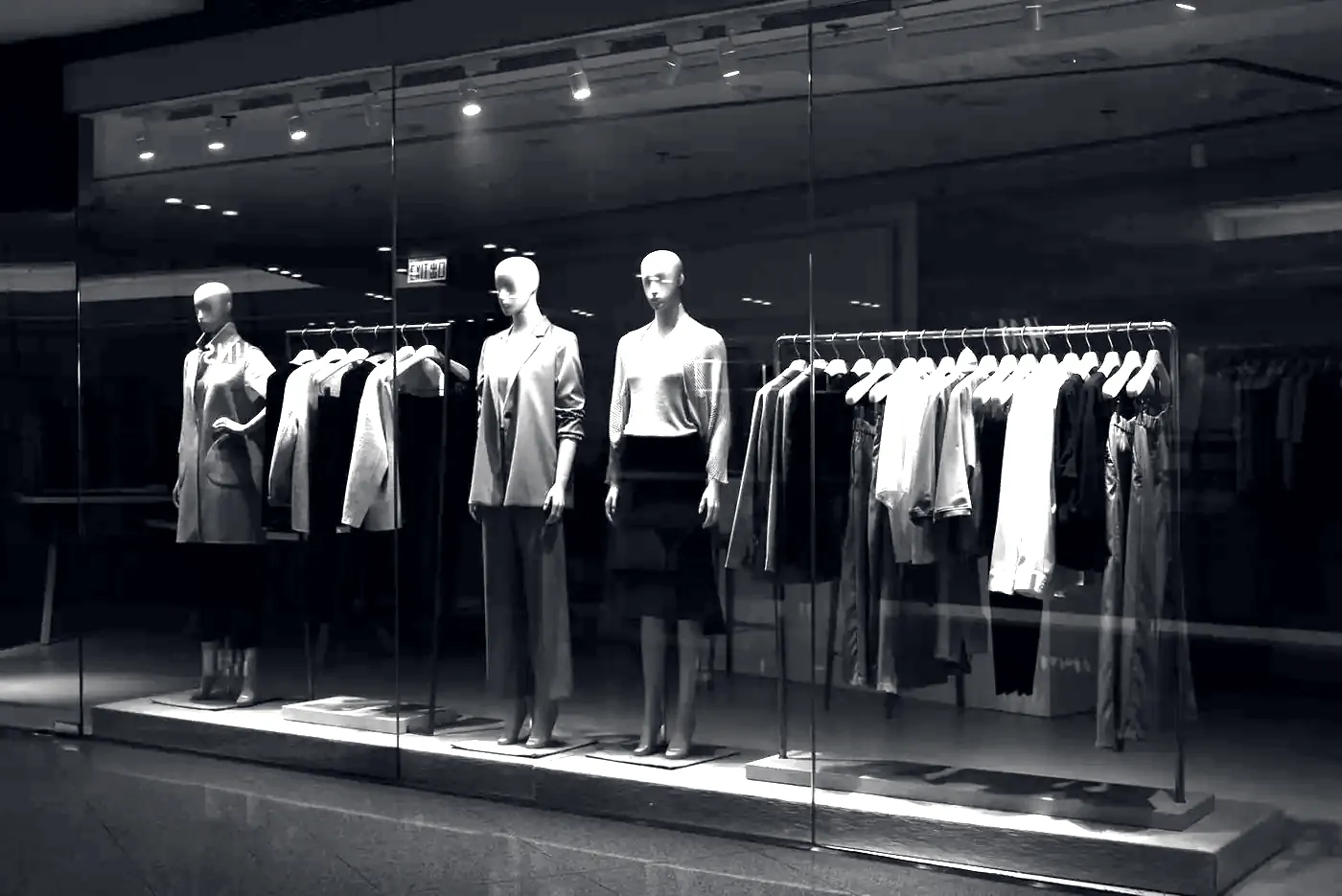 Boutique window display at night